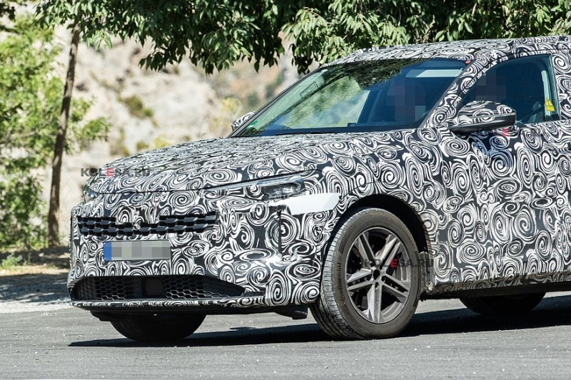 Audi готовит к премьере новые A5 и Q5. Кроссовер поймали во время дорожных испытаний